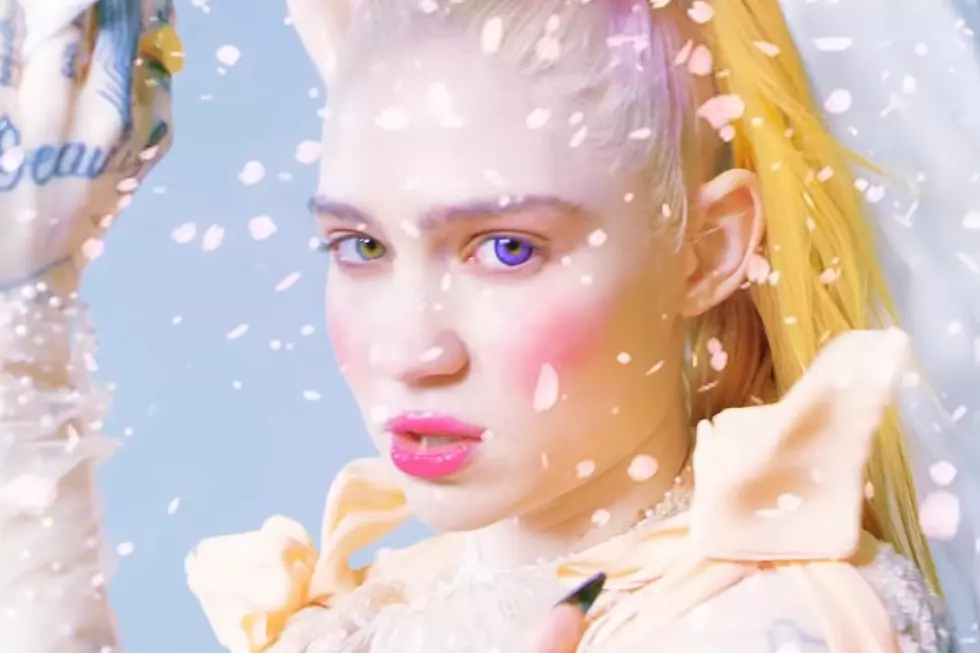 Grimes Just Got a Huge Back Tattoo Done in White Ink